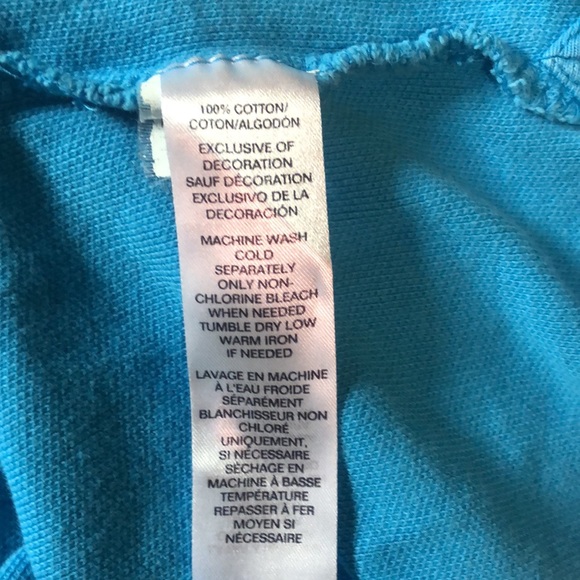 Classic fit world polo shirt in size Xl turquoise color the emblem is pink - Picture 5 of 7